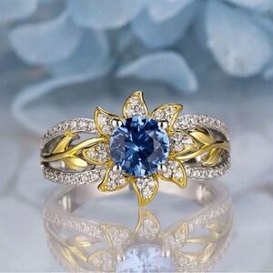 Elegant Blue and Gold Floral Ring.